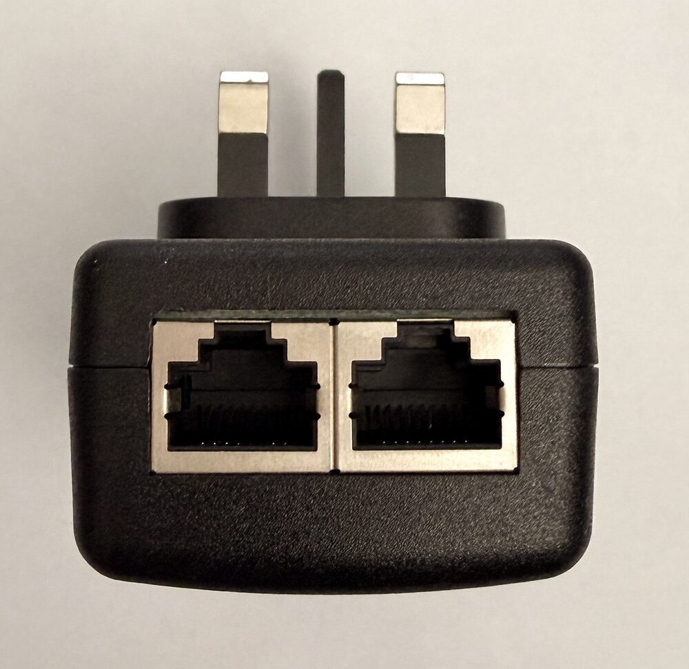 The CaptiFi PoE injector, showing its two ethernet sockets
